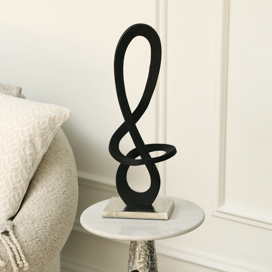 Black Metal Sculpture with Nickel Base