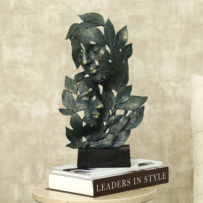 Antique Green Polyresin Couple